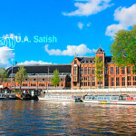Amsterdam Centraal; Amsterdam; railway station; Netherlands; outdoor; canal; water; uasatish; https://uasatish.com; travel; boats;