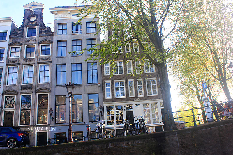 Amsterdam canal cruise; old buildings; Amsterdam; uasatish;