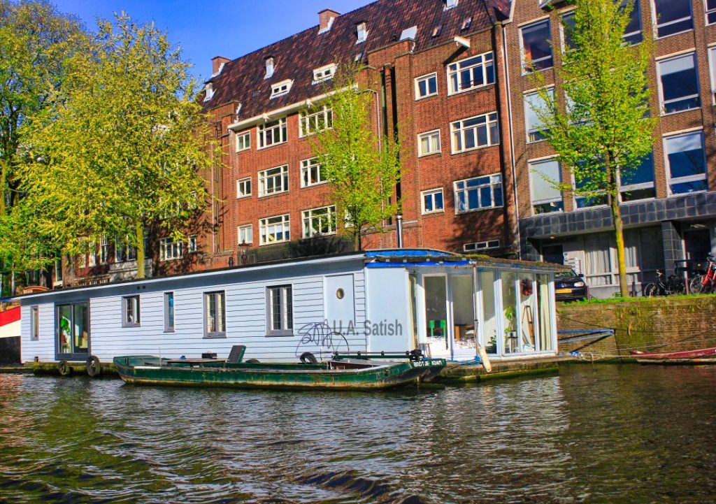 Houseboat on Amsterdam Canal; Amsterdam; Netherlands; uasatish; architecture;