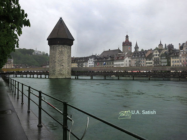 Chapel Bridge; Lucerne; Switzerland; Reuss River; outdoor; travel; clouds; sky; uasatish; buildings;