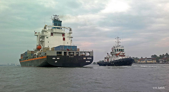 Kochi Harbour; Kochi; Kerala; India; outdoor; container ship; tug boat; outdoor; uasatish; sea;