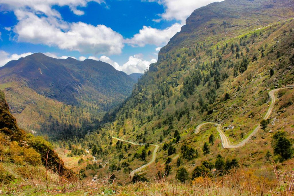 Winding Mountain Road in Sikkim; Skkim; mountains; road; sky; clouds; uasatish;