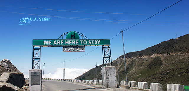 Gangtok-Nathula Road; Sikkim; India; sign; road; sky; white clouds; rocks; uasatish; Nathu La Pass;
