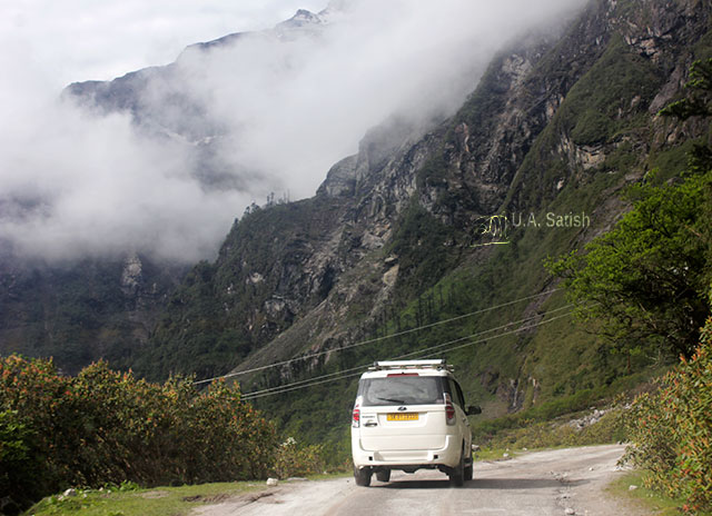 Sikkim; India; road; car; mountain; clouds; uasatish;