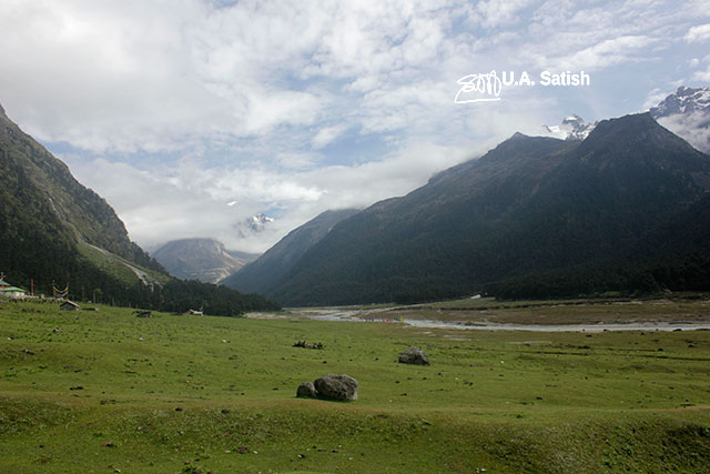 Yumthang; valley; Sikkim; India; stream; mountains; trees; sky; clouds; rocks; uasatish;