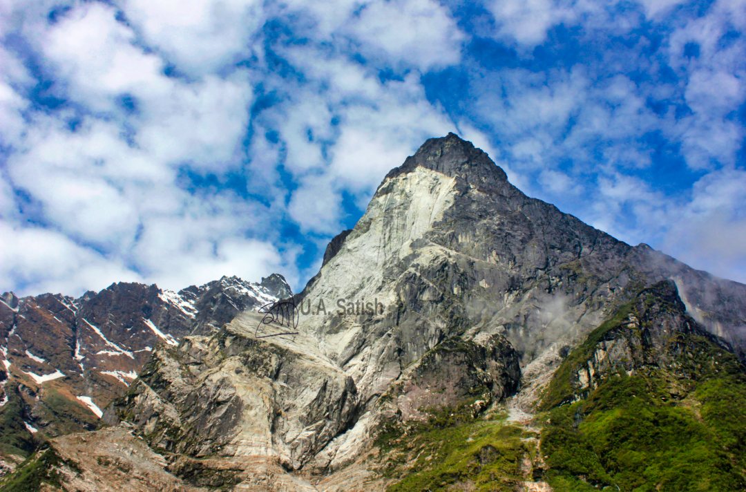 Sheared Mountain Face; uasatish; sky; clouds; Outer Himalayas;