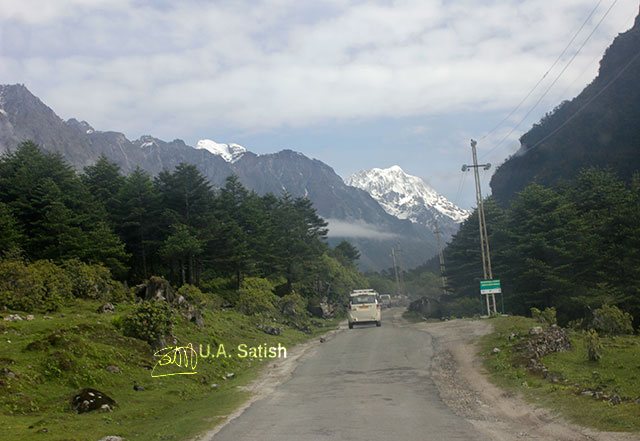 Sikkim; India; road; car; mountain; snow; sky; clouds; trees; uasatish;