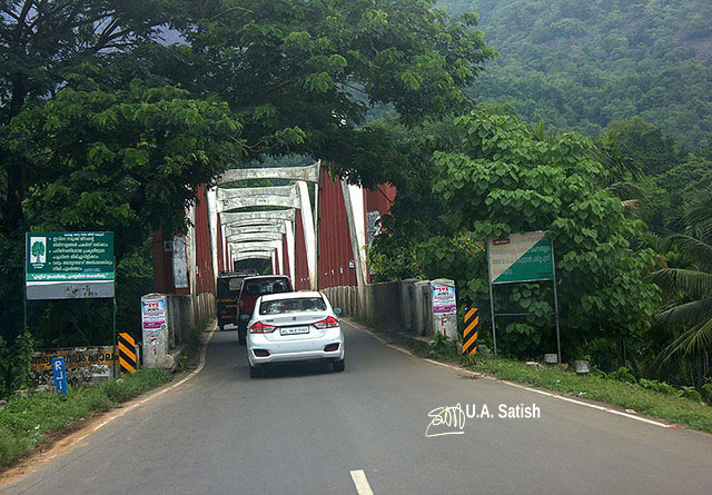 fifteen bridges; Neriyamangalam Arch Bridge; Idukki; Kerala; bridge; cars; trees; road; uasatish;