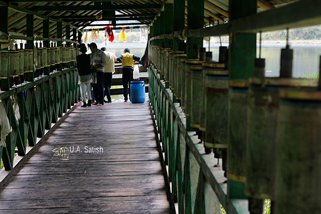 Khecheopalri Lake; Sikkim; India; wooden platform; prayer wheels; uasatish;